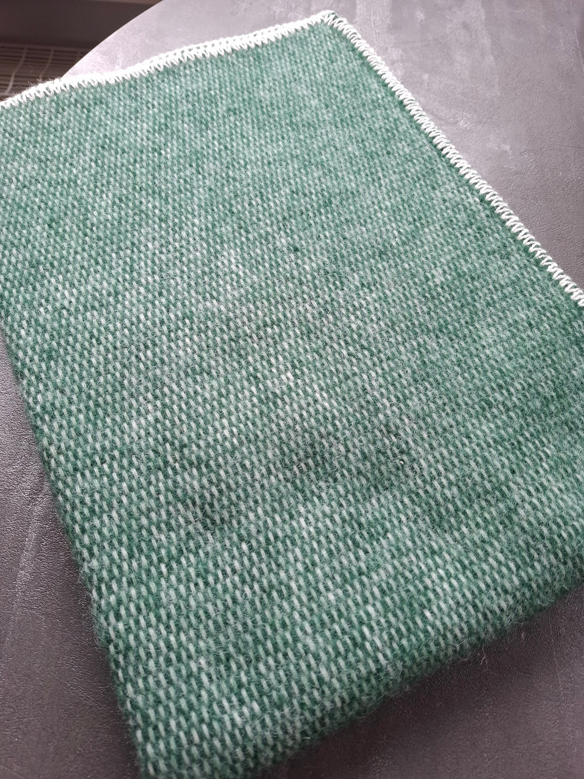 Wollen wiegdeken in verschillende kleuren